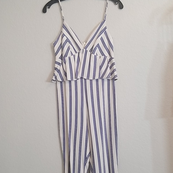 BCBGeneration Striped Peplum Jumpsuit - Picture 12 of 16